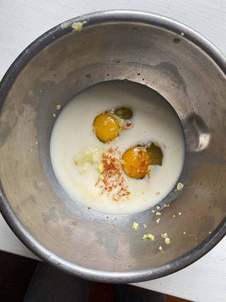 Milk, Eggs, Freshly grated ginger and orange zest combines