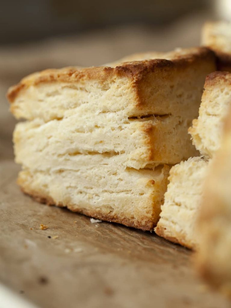 closeup of a flaky sour cream biscuits