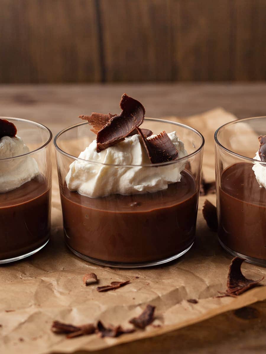 A glass with gluten free dark chocolate espresso pudding expresso