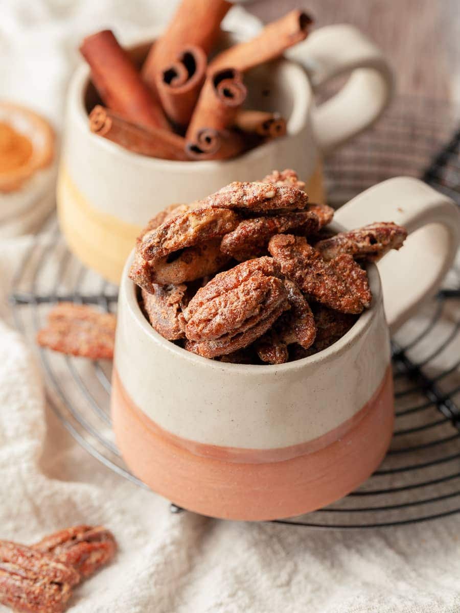 cinnamon roasted pecans in little mugs