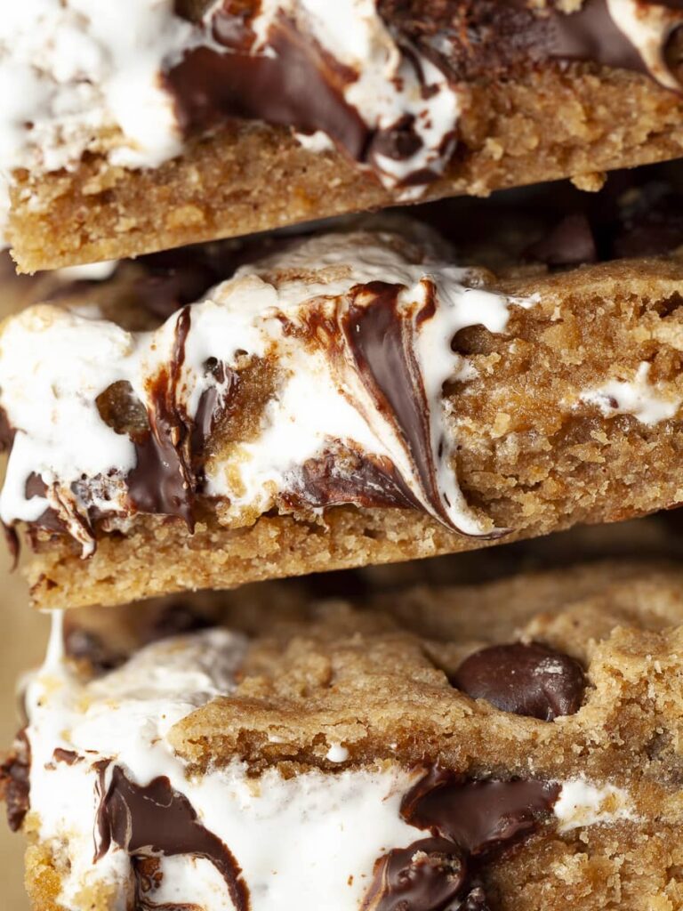 sliced gluten free smores bars with marshmallow cream showing