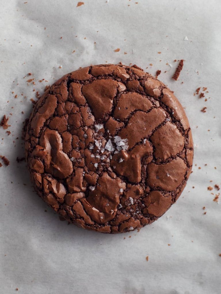 gluten free chocolate fudge cookie with a shiny, crinkle topping 