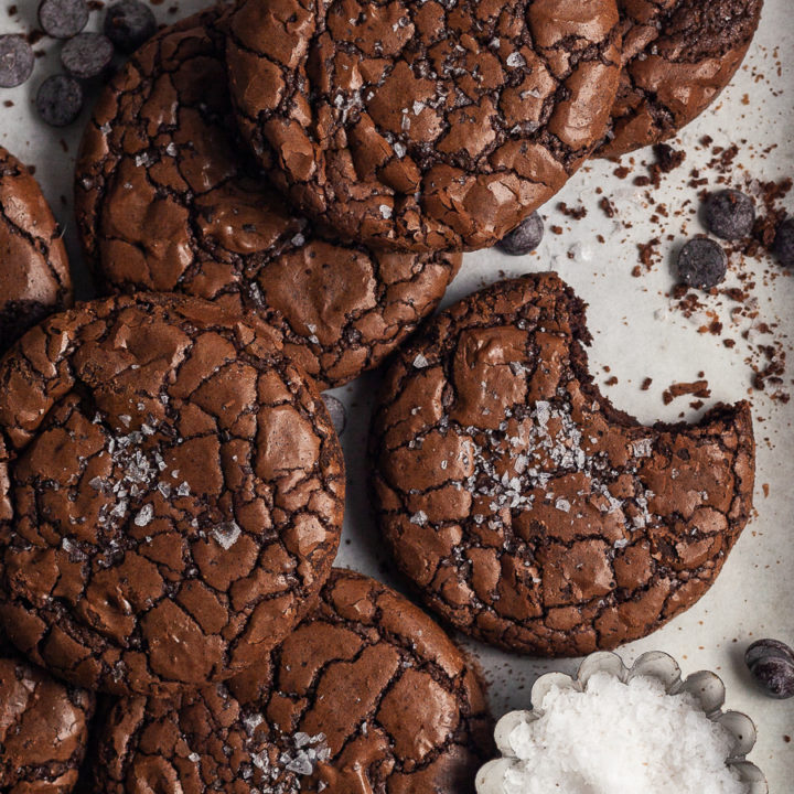 Do you love brownies? Do you love cookies? Then my Gluten Free Fudge Brownie Cookies are exactly what you are looking for. A delectable gluten free chocolate cookie with a crinkle outside with a fudgy center. This recipe is every chocolate lovers ultimate dream come true.