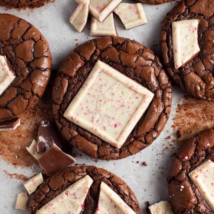 a tray of fresh baked peppermint bark fudgy cookies topped with peppermint bark