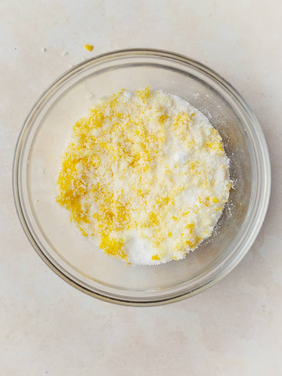 a bowl of lemon zest and granulated sugar