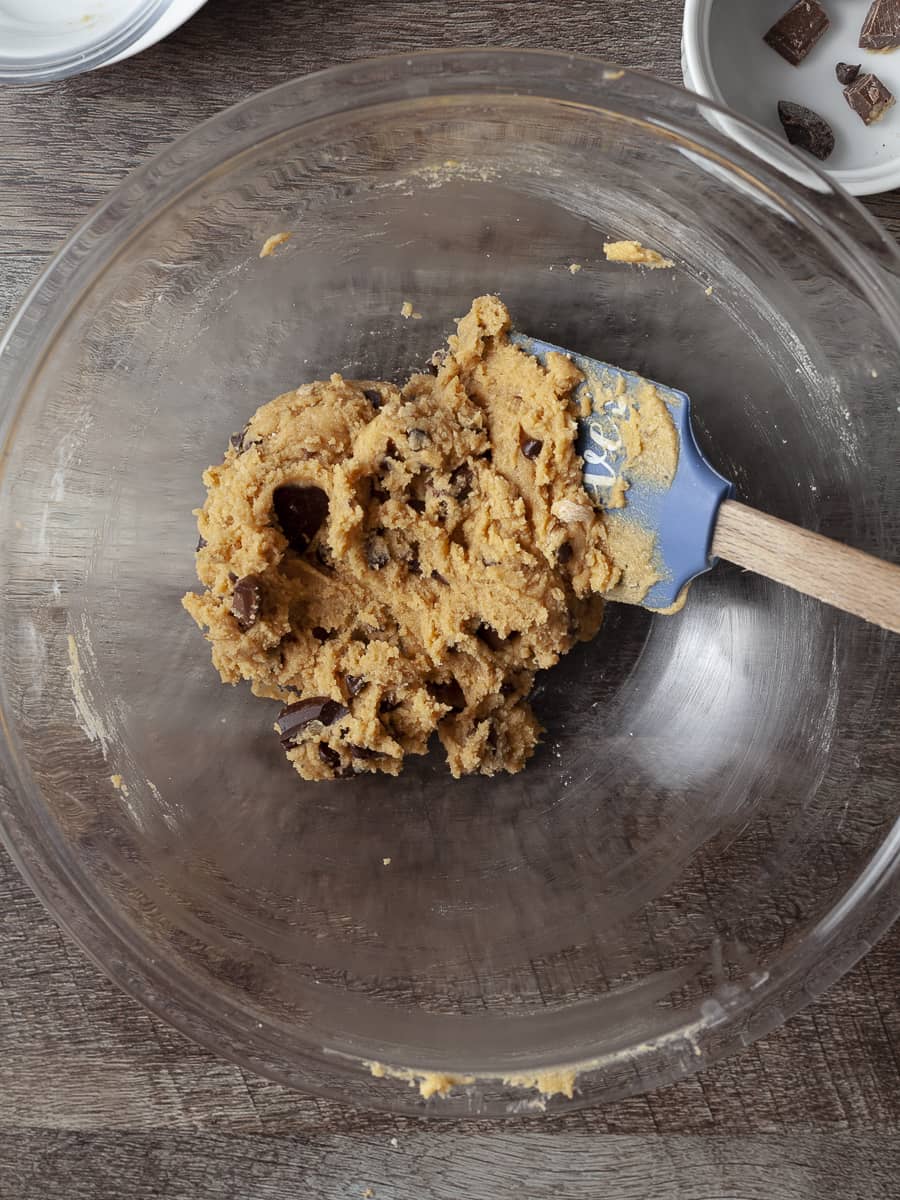 dough for peanut butter chocolate chip cookies in a bowl