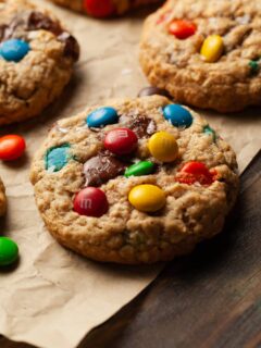 gluten free oatmeal m&m cookies topped with gluten-free m&ms