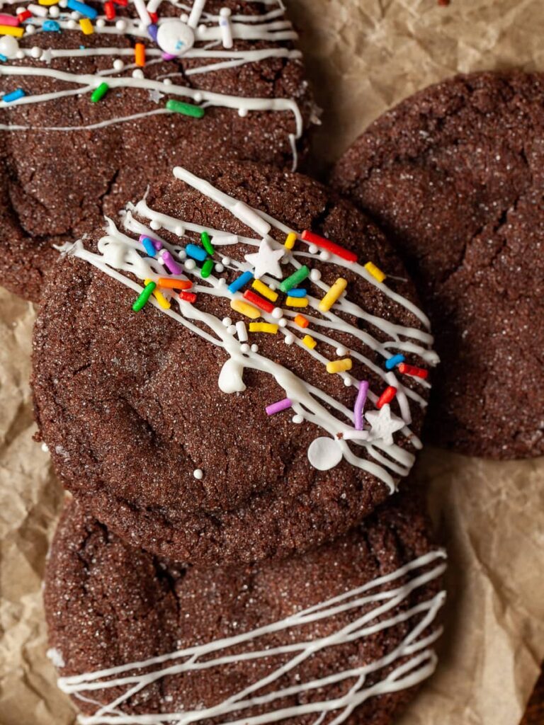 gluten free chocolate sugar cookies drizzled with white chocolate and topped with sprinkles