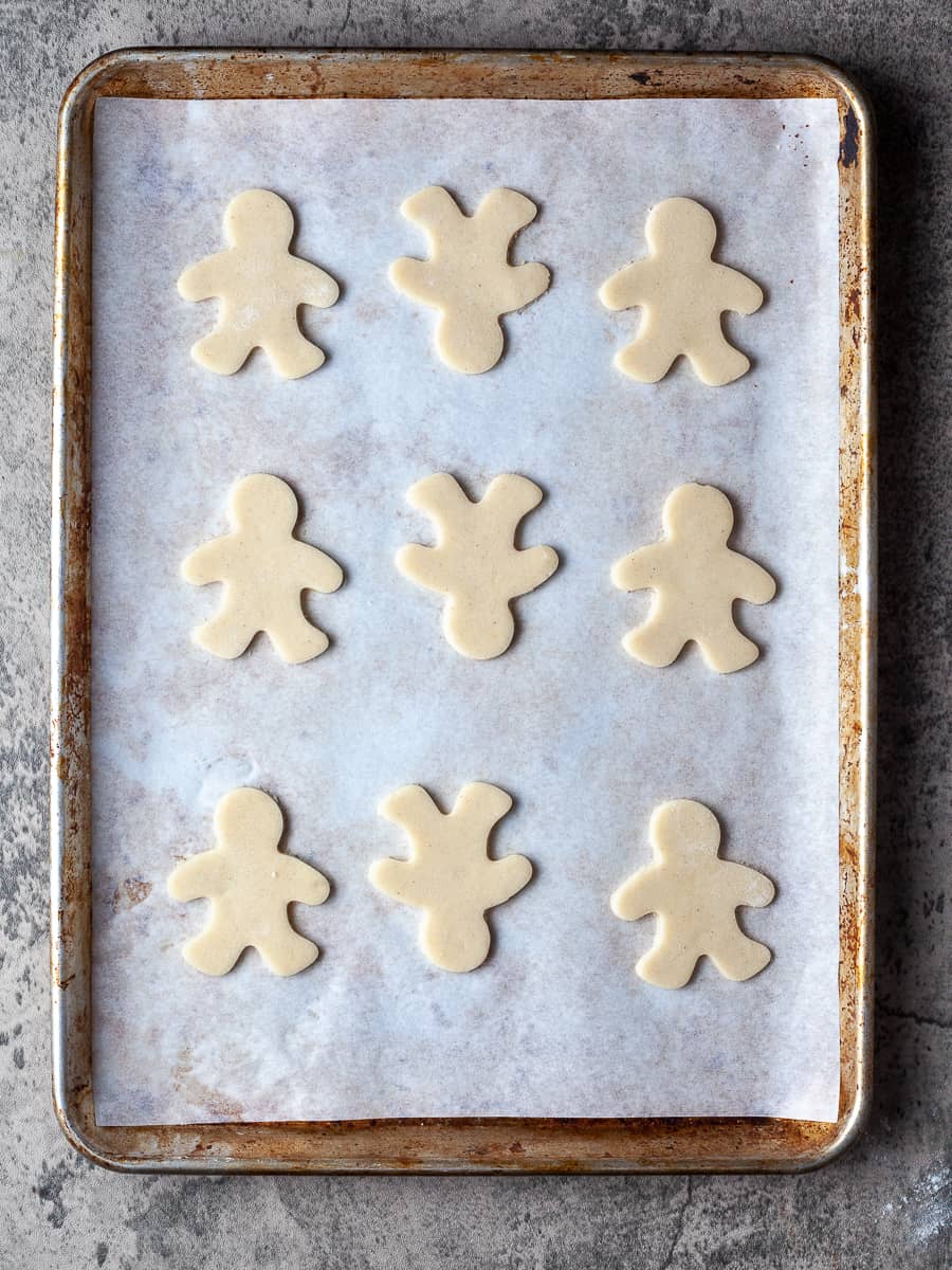 gluten free cut out cookies men on a sheet tray