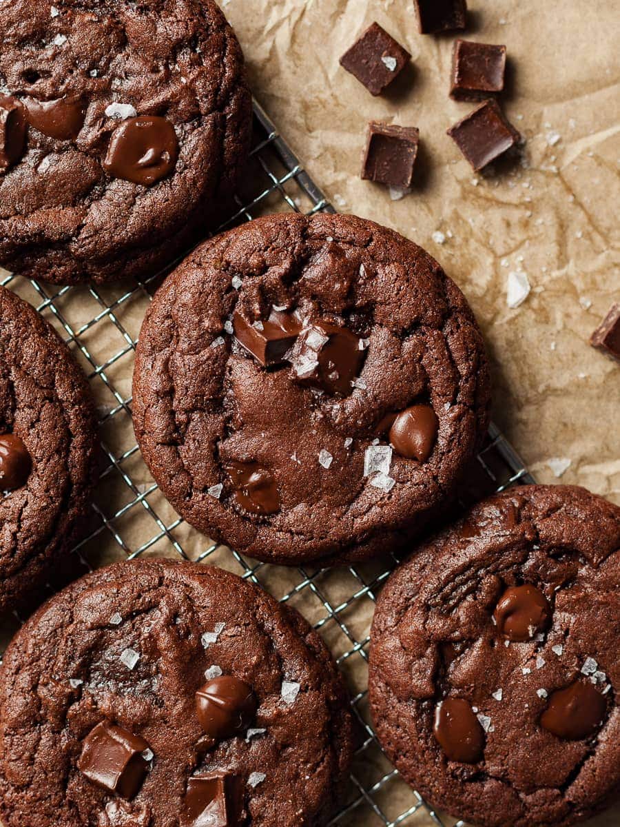 gluten free double chocolate chip cookies with gluten free ingredients, on brown paper