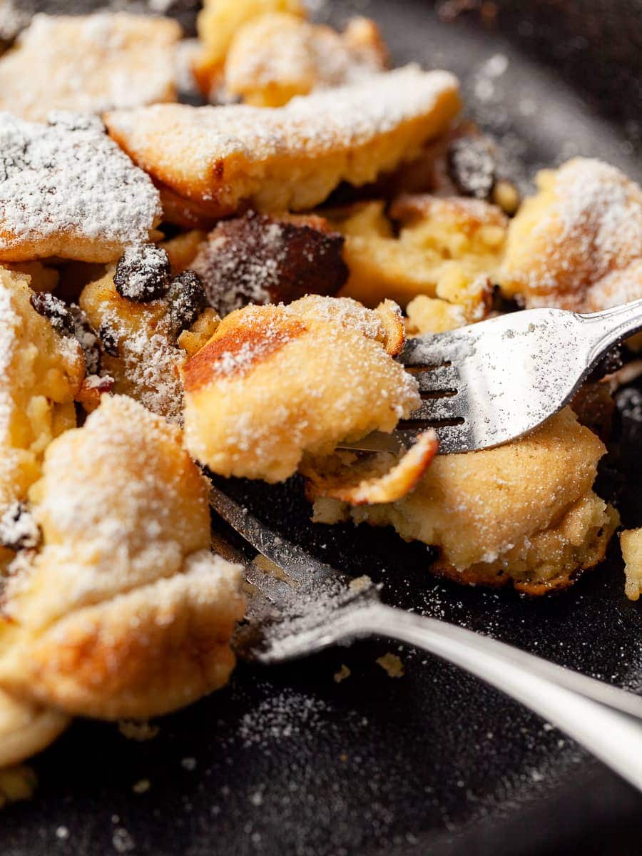 close up of gluten free kaiserschmarrn in a pan with two forks