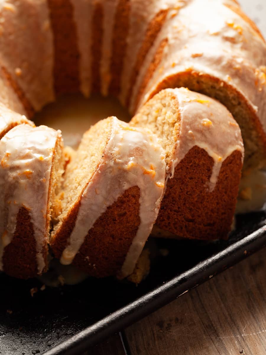 Moist and flavorful gluten-free orange cake made with fresh orange zest and cardamom. Topped with a delicious orange glaze.