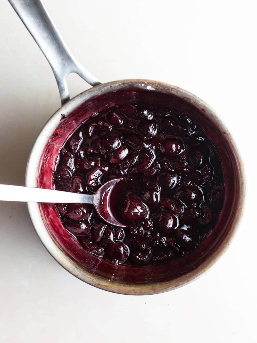a bowl of homemade cherry jam