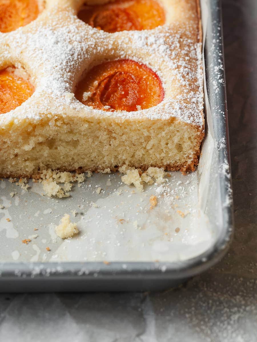 sliced marillenkuchen on a jelly roll pan