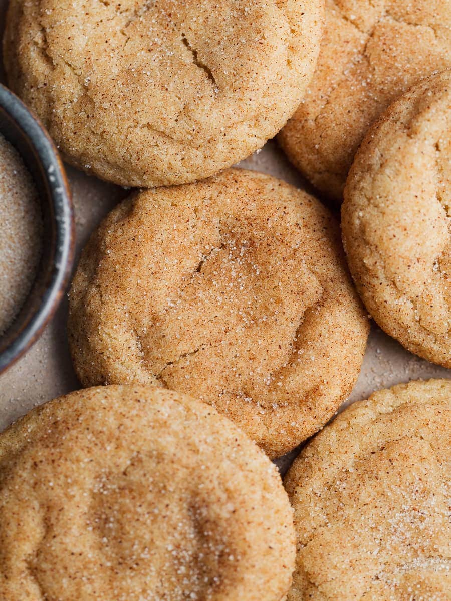 gluten free brown butter snickerdoodles on brown parchment paper