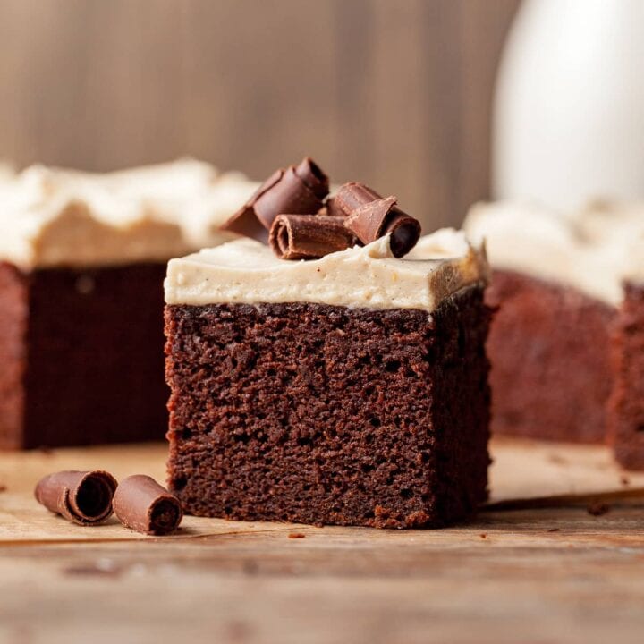 This Gluten Free Spiced Chocolate Pumpkin Cake is a chocolatey twist on my Gluten Free Pumpkin Bars. This moist, tender cake combines the earthy sweetness of pumpkin with the bold flavors of cocoa, cinnamon, and a dash of cayenne for a unique kick. Topped with Spiced Cream Cheese Frosting, it creates a delicious finish that perfectly matches the chocolate and spice flavors.