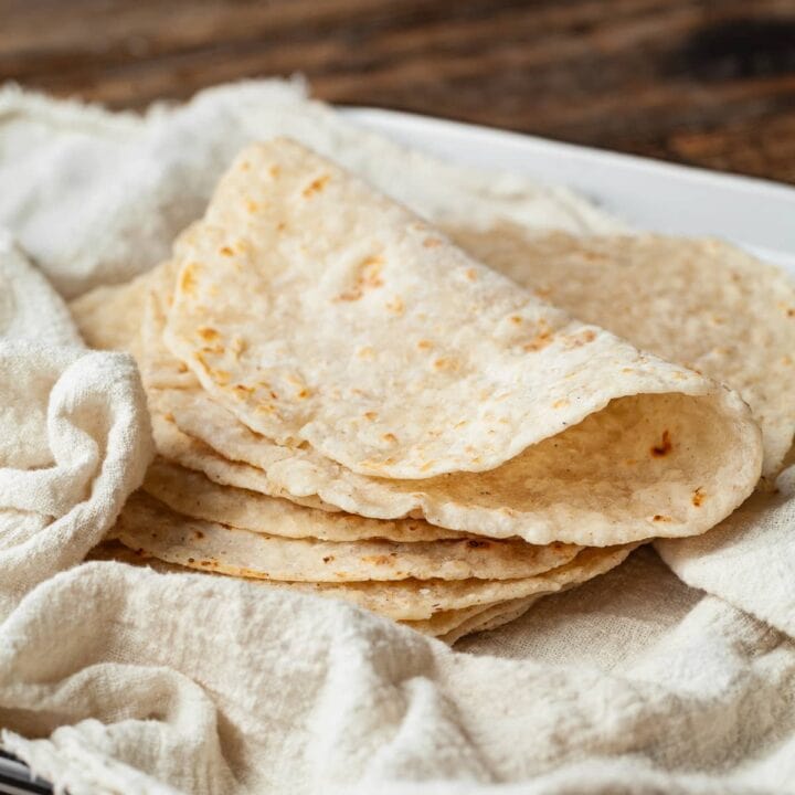 Make taco night special with this easy small batch gluten-free flour tortilla recipe! Soft, pliable, and perfect for wraps or quesadillas!