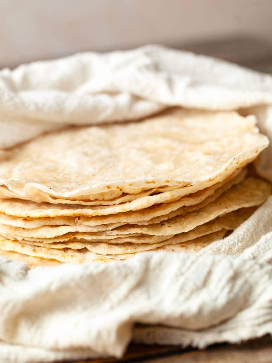 a stack of gluten free flour wraps