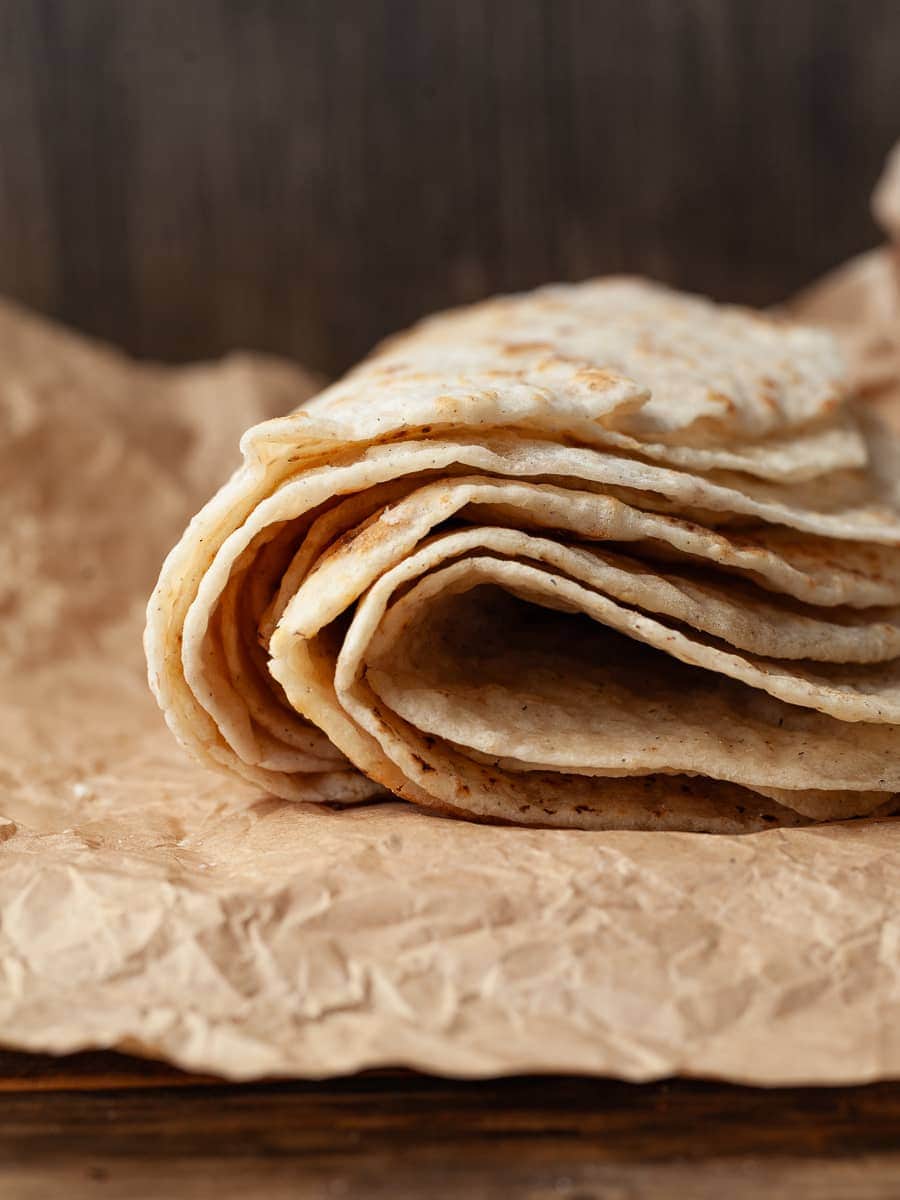 Make taco night special with this easy small batch gluten-free flour tortilla recipe! Soft, pliable, and perfect for wraps or quesadillas!