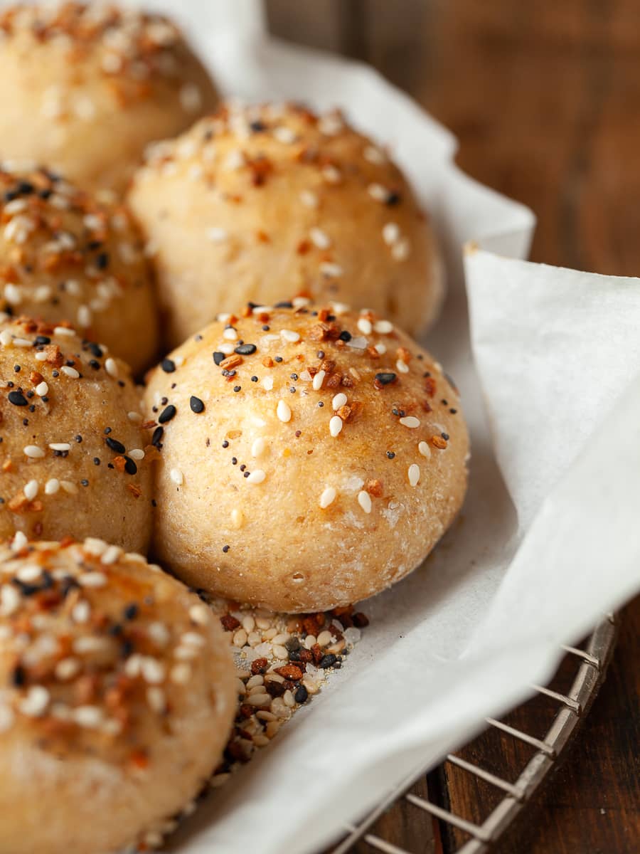 Gluten Free Bubble Bread (or Partybrot in German) is made for sharing. Picture tiny gluten free dinner rolls, each stuffed with creamy cheese and topped with bagel seasoning, all baked together in a warm, fluffy, golden loaf. As the bread bakes, the rolls meld into one irresistible, pull-apart masterpiece that's perfect for gatherings and family style meals. Fair warning, you can’t just eat one... this bread is so addictive, it’s impossible to resist!