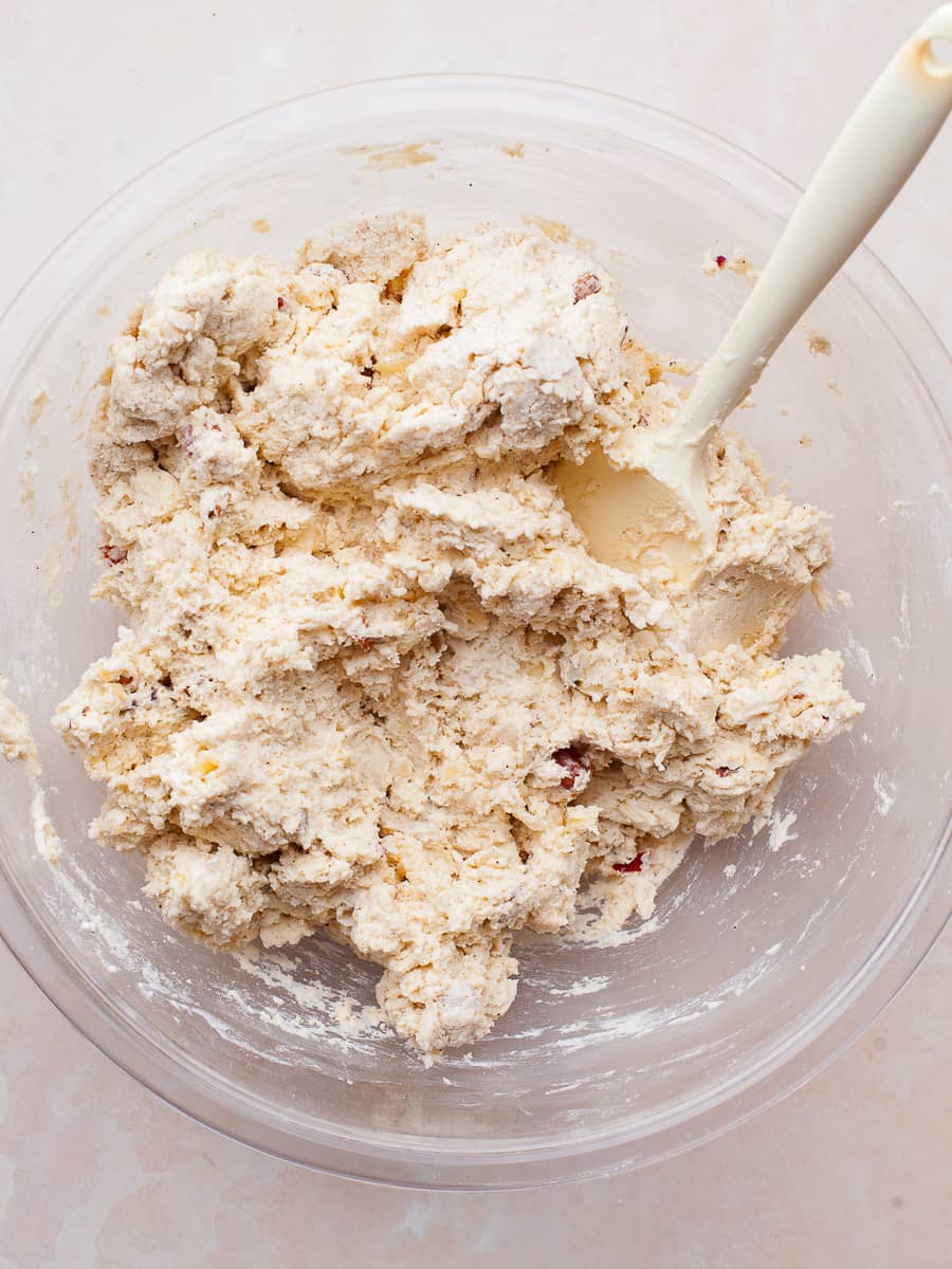 batter for a gluten free savory quickbread in a bowl with a spatula