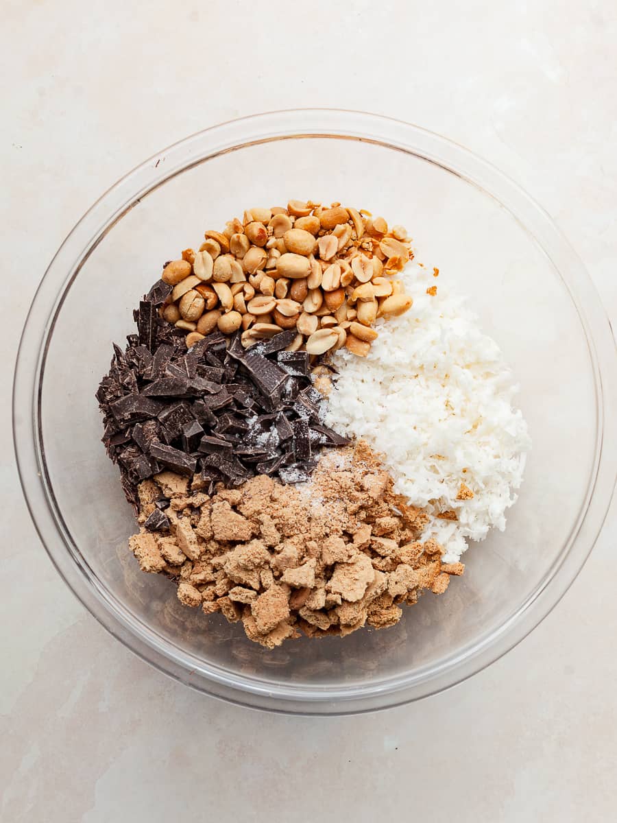 dry ingredients needed for gluten free magic cookies in a large mixing bowl