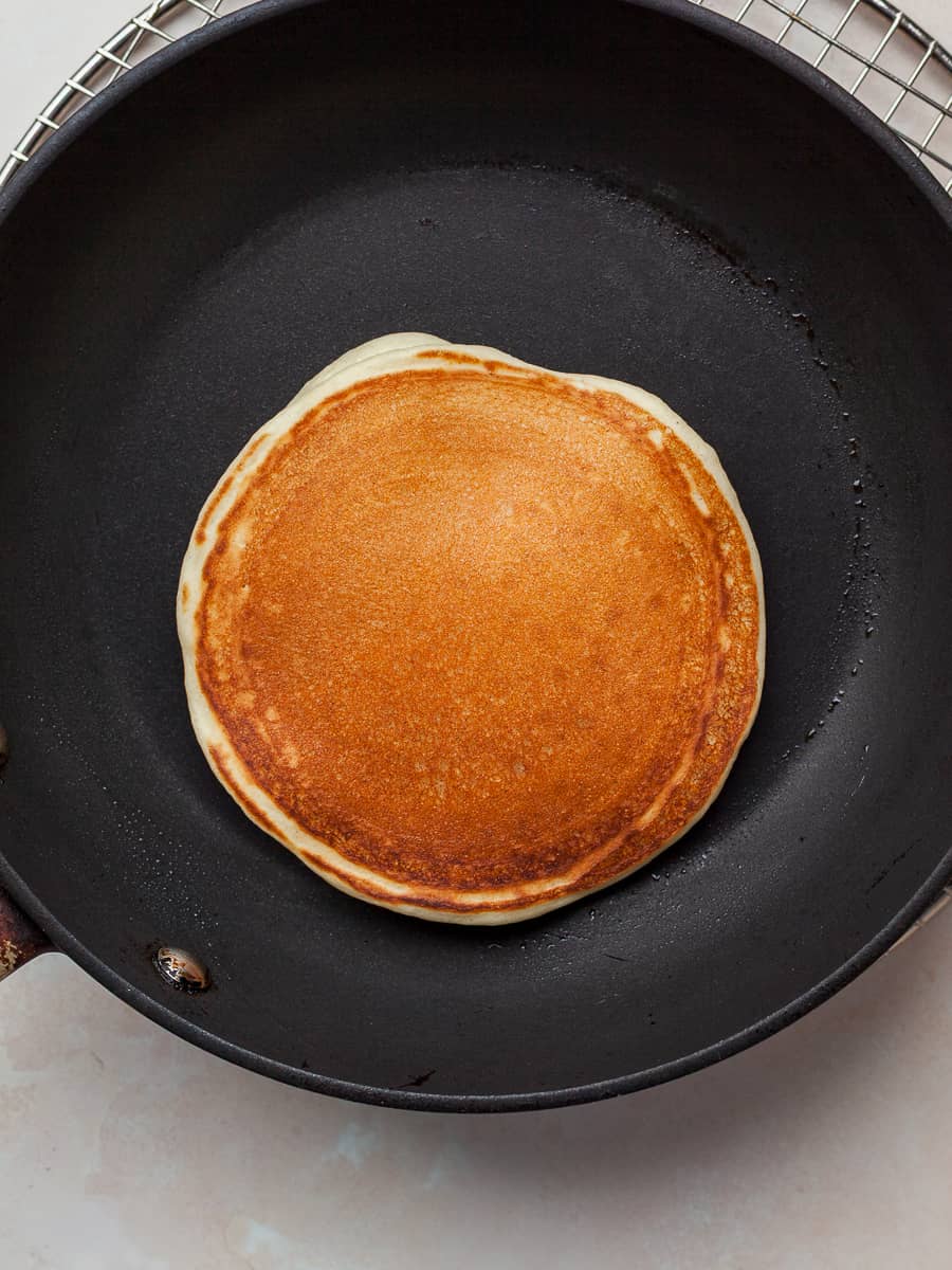 gluten free pancake in an all clad pan
