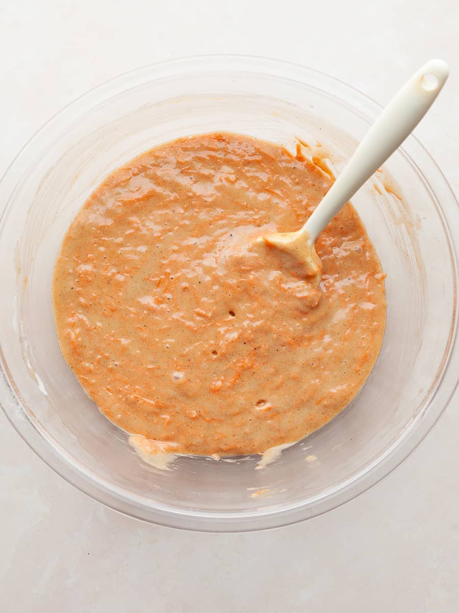 batter for carrot muffins in a bowl