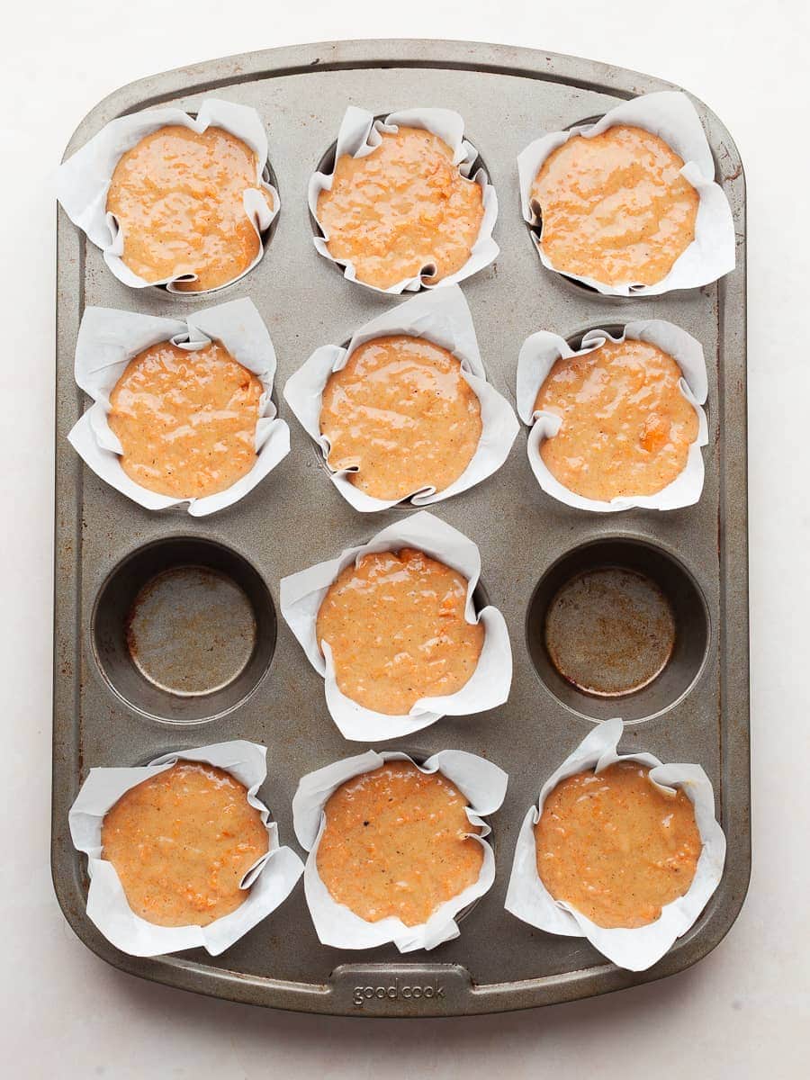 carrot cake muffin batter in homemade muffin liners