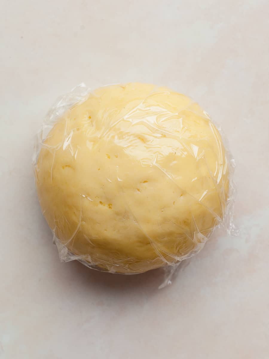 gluten free fresh pasta dough wrapped in plastic wrap