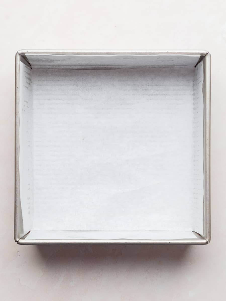 a lined 8x8 baking pan