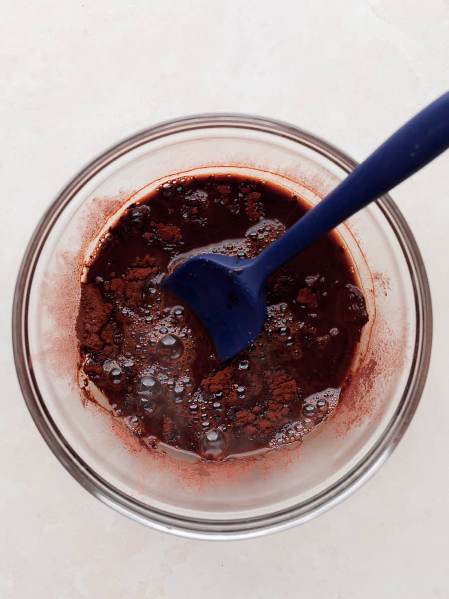 a bowl with bloomed cocoa powder