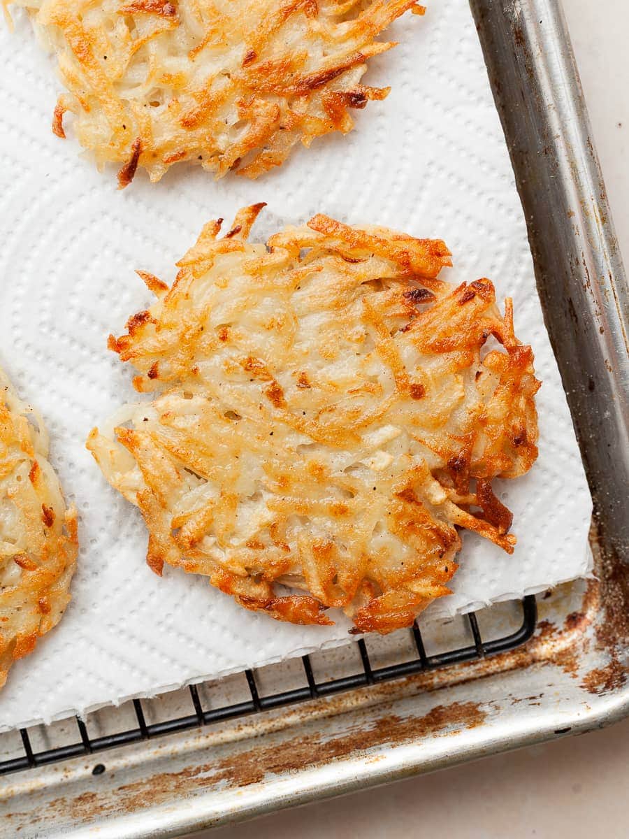 fried potato pancakes on paper towels