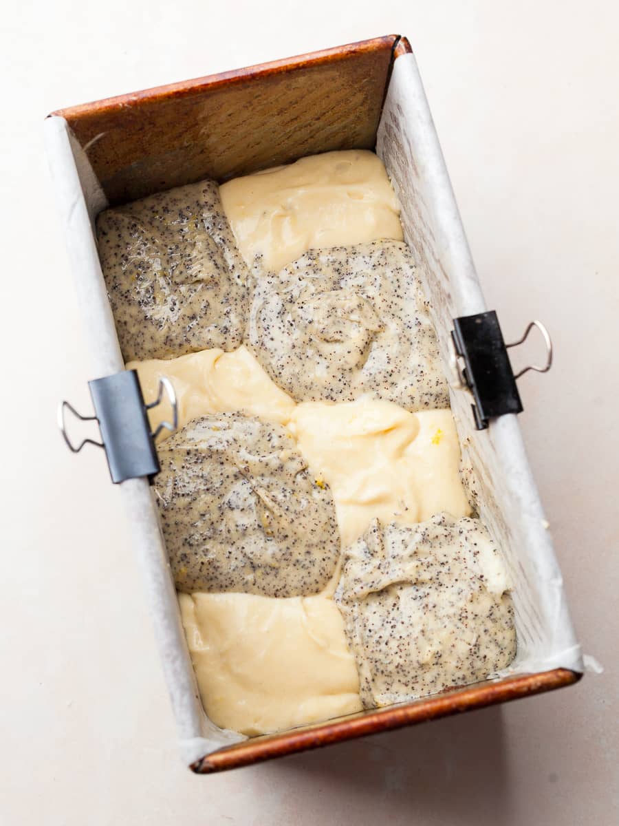 gluten free lemon poppy seed cake batter in the loaf pan