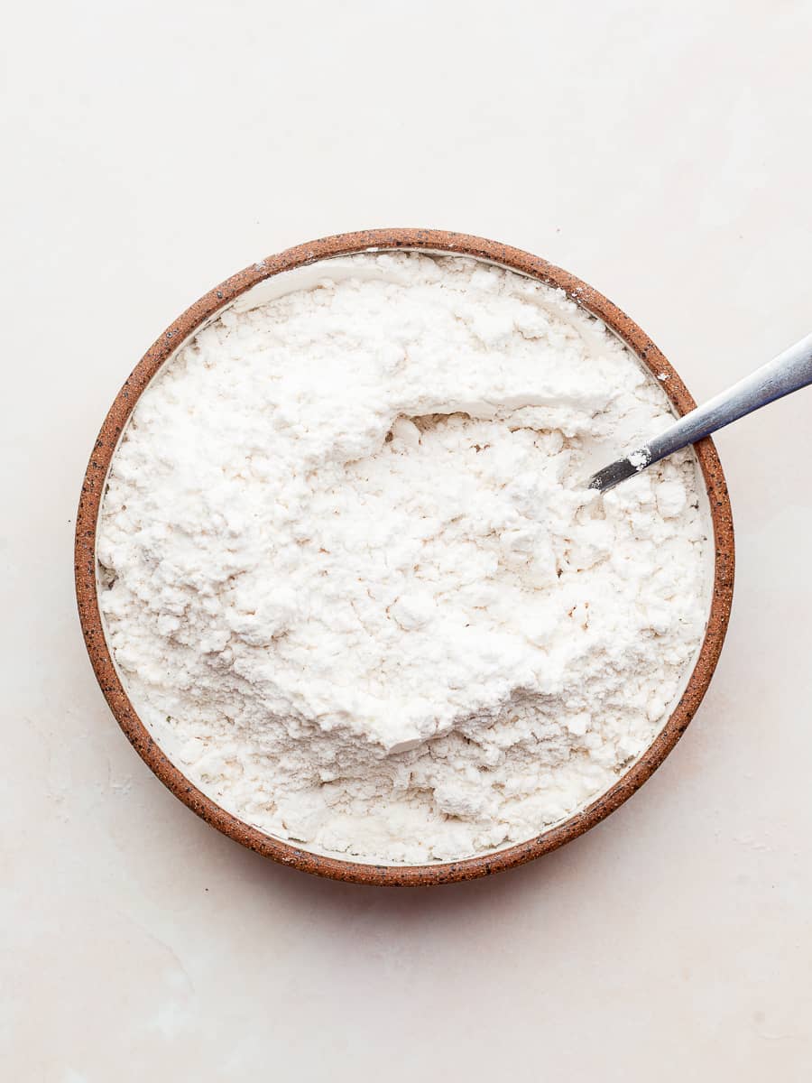 plate with spoon and gluten free flour