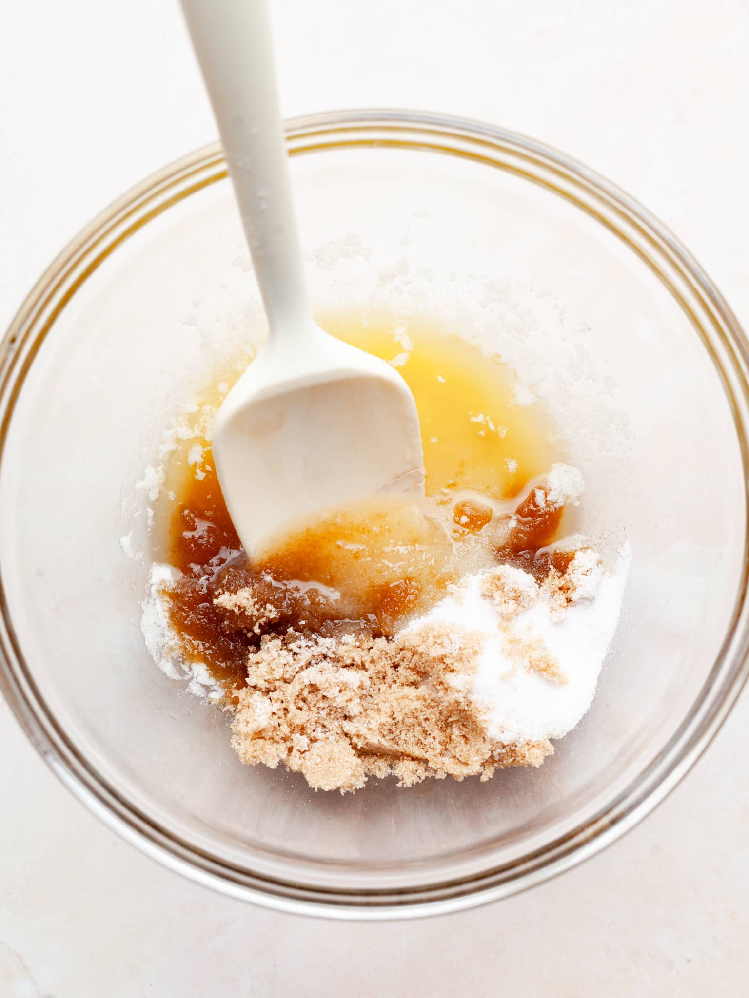 sugar and melted butter in a bowl