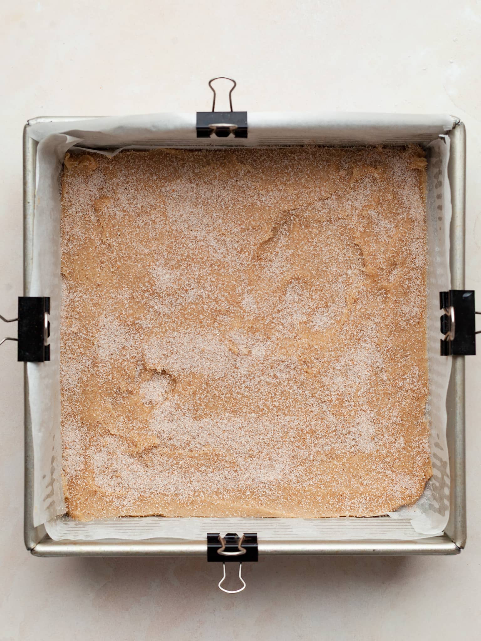 snickerdoodle cookie dough topped with cinnamon sugar