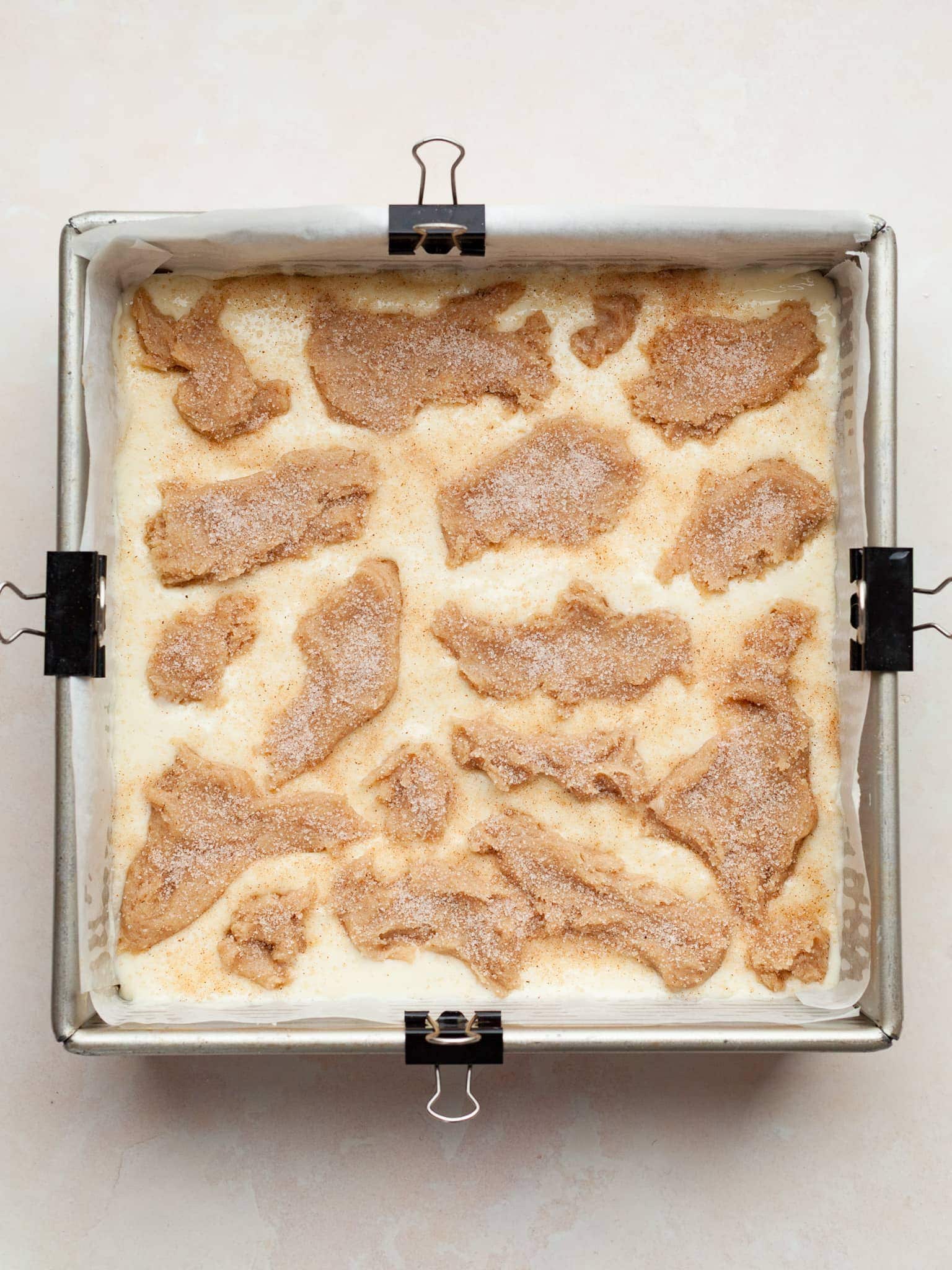 gluten free snickerdoodle cheesecake cookie bars ready to be baked