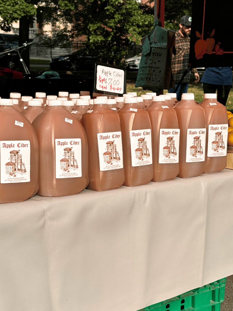 fresh apple cider at the farmers market