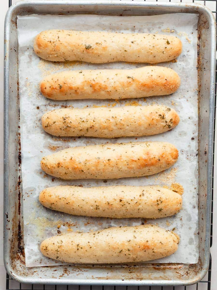 gluten free breadsticks on a sheet tray